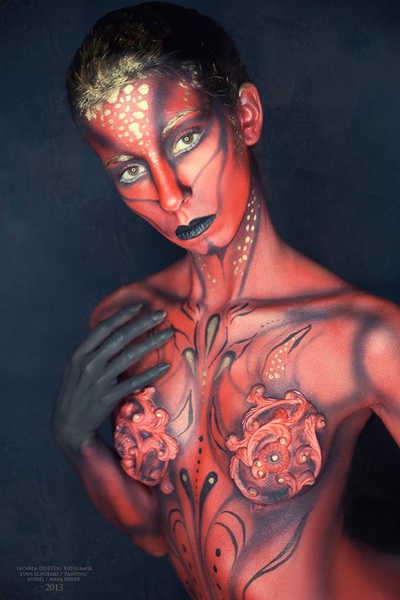 red abstract body paint